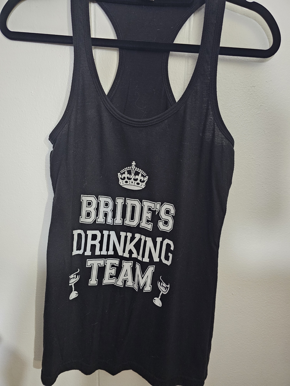 Black Tank Top with White Care Tag